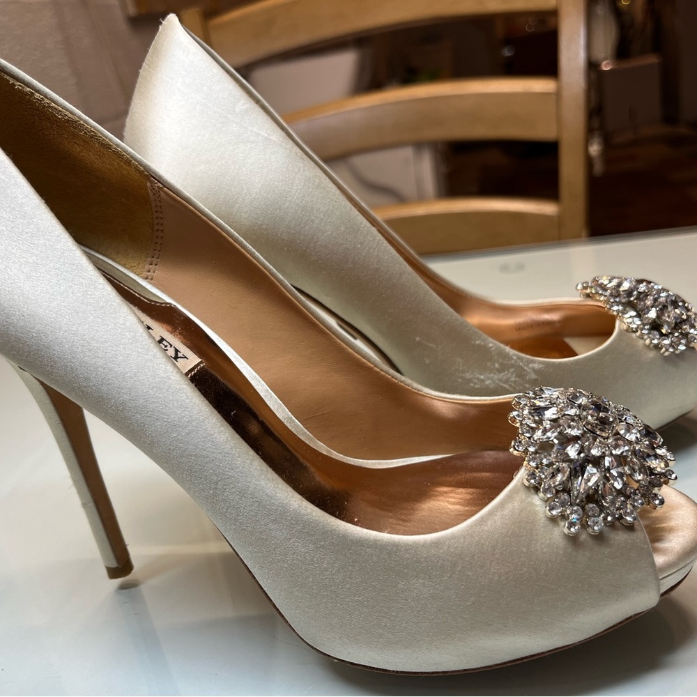 Badgley Mischka “Jeannie” Peep Toe Pump: Satin-Ivory with Jewel Cluster.